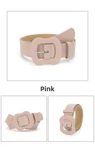 Detail of pink wide faux leather belt with matching large rounded rectangular buckle