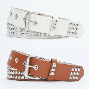 Punk style leather belts with three rows of silver pyramid studs in white and brown