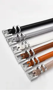 Detail view of genuine cowhide leather straps with elegant alloy pin buckles in various colors