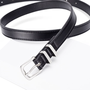 Minimalist black leather belt for women featuring a sleek silver buckle and twin metal loops