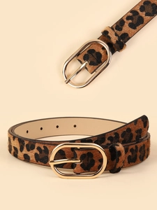 Close-up of leopard print belt with faux calf hair texture and golden oval buckle