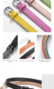 Détail de fines ceintures en cuir PU coloré avec boucles en métal poli et bords lisses