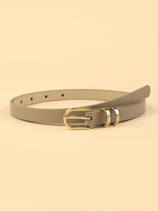 Close-up of leopard pattern PU belt with golden D-shaped metal buckle and smooth finish