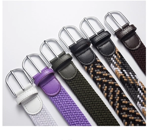 Detail of woven elastic belts featuring polished alloy buckles and various color textures