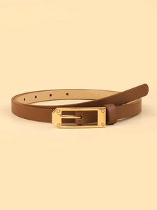 Detail of slim dark brown leather belt featuring a polished gold rectangular buckle