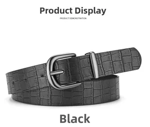 Detailed close-up of black PU leather belt featuring crocodile skin texture and silver buckle