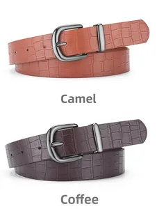 Close-up of camel and coffee faux leather belts with crocodile pattern and pin buckle