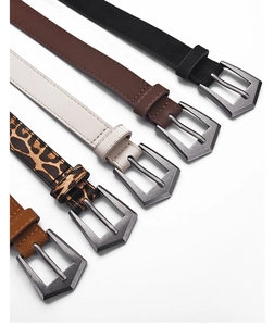 Detail view of stylish women belts in five colors with unique pentagon metal buckles