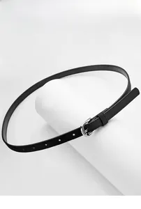 Detailed macro view of a slim black leather belt featuring a silver metallic needle buckle