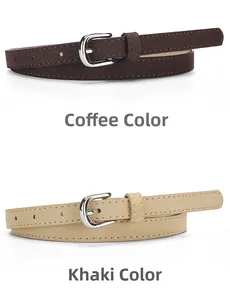 Detail of coffee and khaki suede skinny belts with silver pin buckles and fine stitching