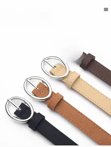 Close-up of four suede PU leather belts for women with silver oval buckles in diverse colors