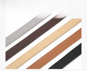 Detailed close-up of matte PU leather skinny belts in five colors with fine stitching