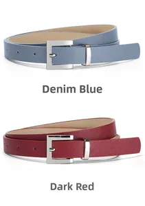 Close-up of denim blue and dark red slim leather belts with silver metal buckles