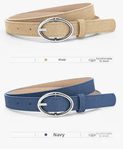 Detail view of khaki and navy frosted suede belts with oval silver pin buckles
