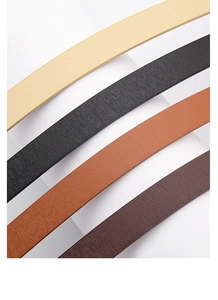 Close-up of high-quality leather belts in four colors with fine vertical texture