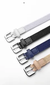 Detail showing white, black, navy, and beige elastic woven belts with cowhide leather trim