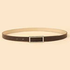 Detailed close-up of dark brown leather belt with polished silver rectangular buckle