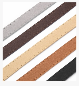 Detail of suede PU leather belts showing neat stitching and multi-color matte texture