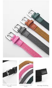 Detail showing elastic woven belt textures, silver pin buckles, and reinforced end tips