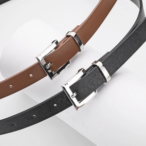 Minimalist women leather belts in black and caramel brown with elegant silver buckles