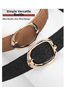 Détail de ceintures tressées bohèmes noires et marron avec boucles dorées ovales brillantes