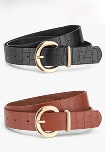 Détail de ceintures pour femmes en PU à motif crocodile avec boucles dorées noir et camel