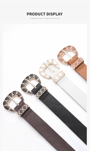 Detail showing four vintage PU leather belts with decorative horseshoe buckles in assorted colors