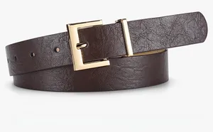 Detail of coffee brown leather belt featuring premium litchi texture and gold square buckle