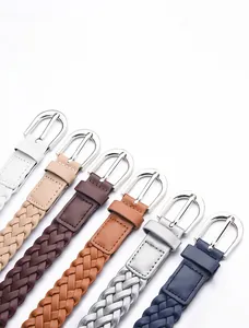 Detailed view of woven leather belts in six colors with silver polished metal buckles