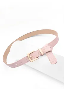 Close-up of pink faux leather belt with crocodile pattern and golden square buckle