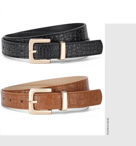 Close-up of retro crocodile pattern leather belts with elegant gold square buckles