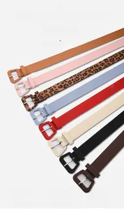 Detailed display of thin leather belts for women in eight assorted colors and leopard print
