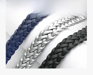 Detail of woven leather belts in blue, silver, and black with fine braided texture