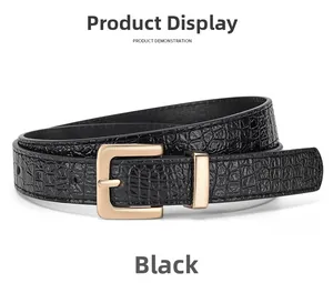 Detail view of black crocodile pattern leather belt with golden square buckle for women