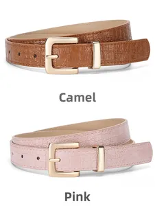 Detail view of camel and pink crocodile pattern belts with gold square buckles