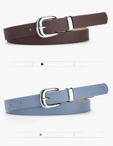 Detail of minimalist PU leather belts in coffee and blue with silver pin buckles