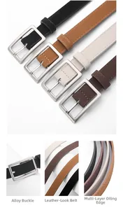 Detailopname van de meerlaagse olie-afwerking en de geborstelde legering gesp van de riem