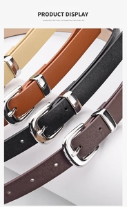 Close-up of minimalist PU leather belts with silver metal buckles in multiple colors