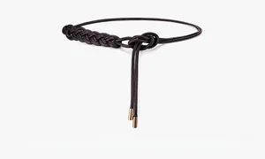 Close-up of coffee-colored braided leather belt with gold metal tips for dresses