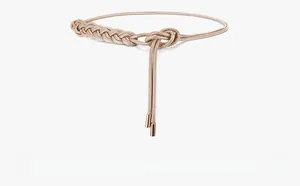 Close-up of woven khaki leather cord waist belt with elegant rose gold metal ends
