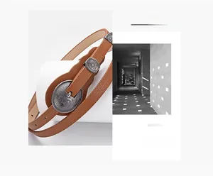 Close-up of vintage brown leather belt featuring engraved silver buckles and floral texture