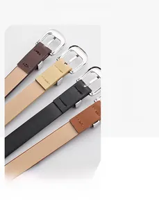 Close-up of four colored PU leather belts showing needle buckles and reinforced stitching