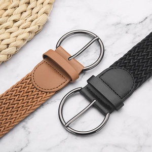 Cinture intrecciate in nero e marrone con fibbie tonde in metallo per donna