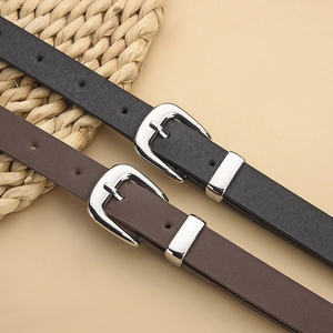 Minimalist PU leather belts in black and brown with polished silver pin buckles