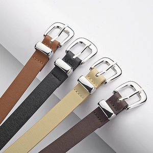 Minimalist PU leather belts with fine grain and silver buckles in four versatile colors