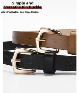 Close-up of golden alloy pin buckle and fine PU leather texture on black and brown belts
