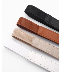 Detail showing elastic waist belts in four colors with faux leather stitching and textures