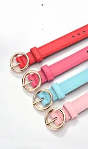 Detailed view of colorful leather belts for kids with golden round pin buckles
