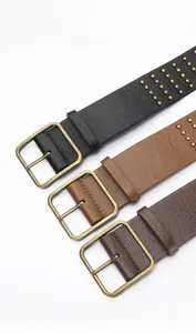 Three punk style leather belts with double row eyelets and vintage metal buckles