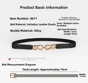 Detail view of 1.5cm wide black elastic waist belt with interlocking gold buckle